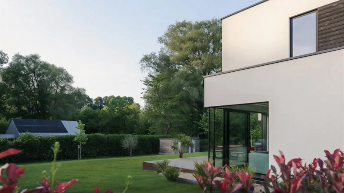 photo façade côté villa crépi blanc et jardin